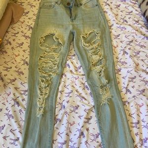 Size 0 women , washed blue colour ripped jeans